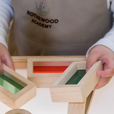 Early Childhood Learning | Playing Wooden Cubes at Rothewood Academy