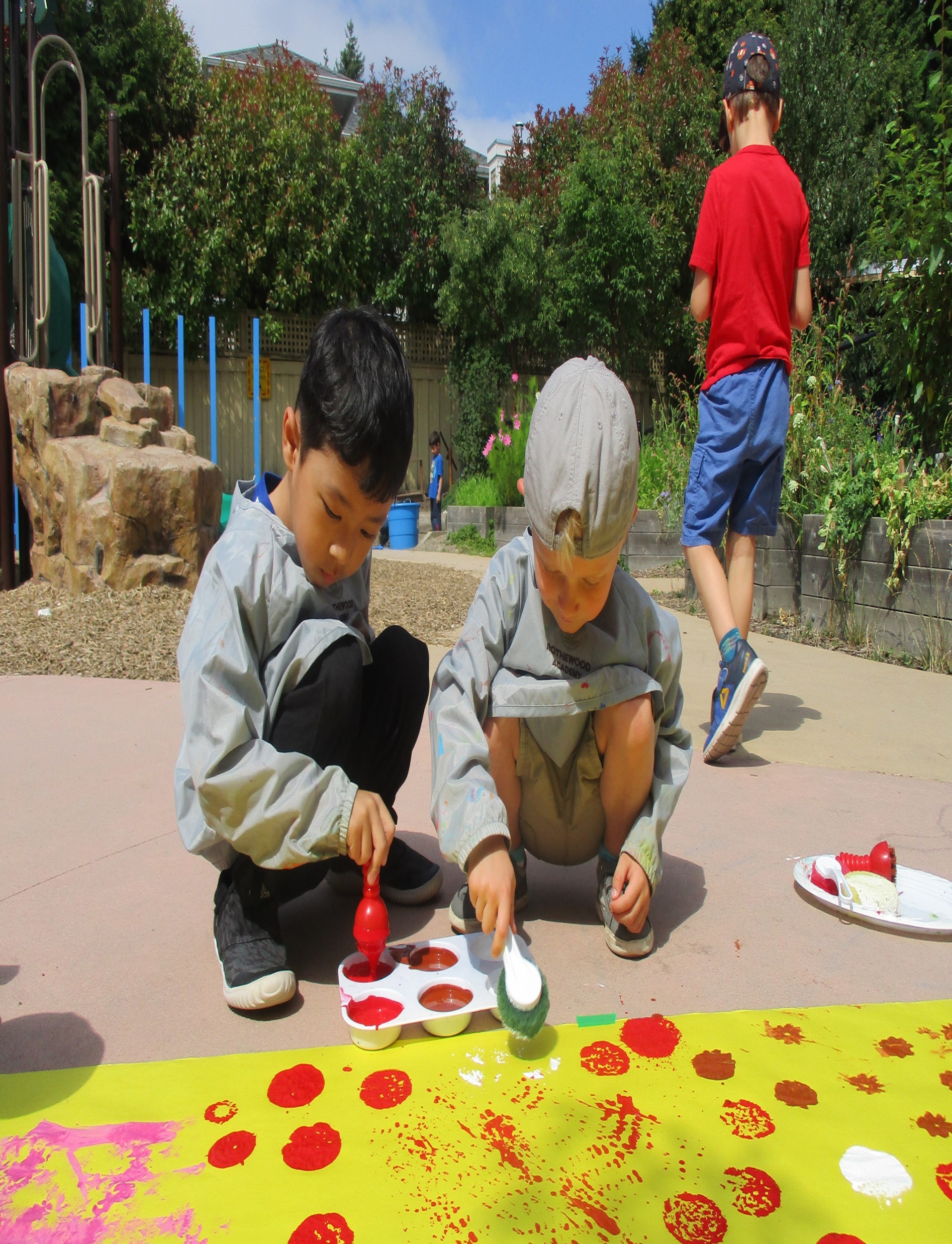 group art mural on playground ss